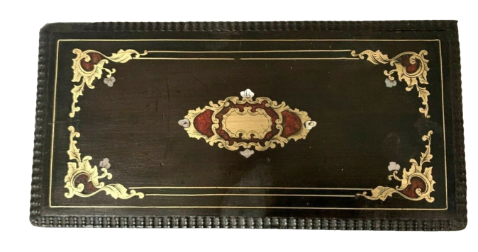Coffret Napoléon III en bois noirci et marqueterie de laiton gravé. XX siècle .