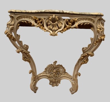 Console sculptée de style Louis XV en bois peint et doré XX siècle
