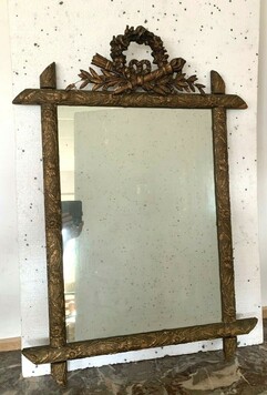 Miroir de style Louis XVI en bois et stuc patiné XX siècle