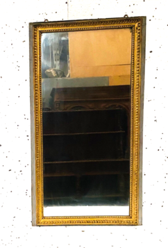 Miroir Louis XVI en bois sculptée patine originale . XIX siècle .