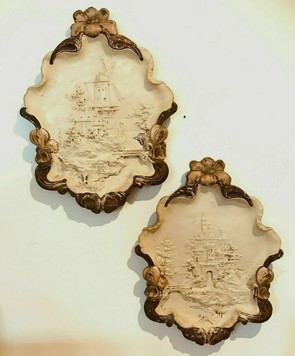  Pair of decorative patinated stucco plaques 