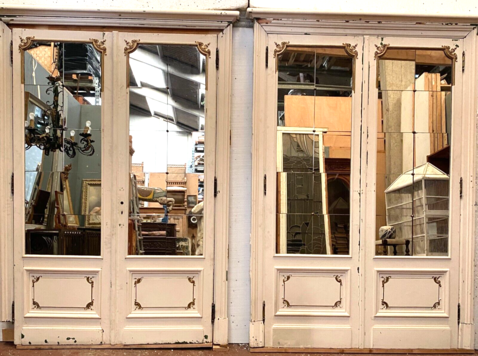 paire de deux double portes à petit carreaux de miroir patine . XX siècle .