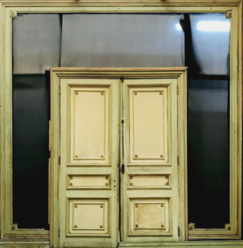 séparation deux portes double face en bois patiné à trois panneaux . XIX siècle.