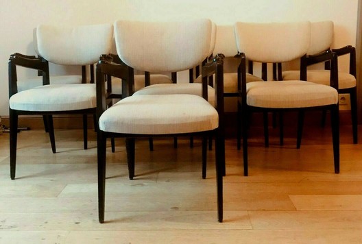 Suite de huit fauteuils design des années 60 en bois noirci XX siècle