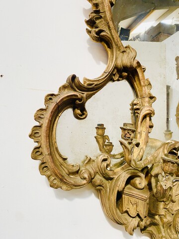 applique formant miroir à parcloses en bois sculpté doré. XIX siècle .