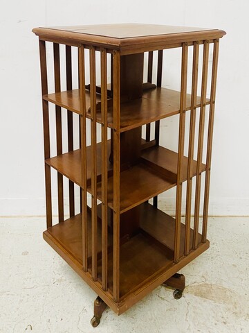 bibliothèque tournante en noyer massif estampille de G Lancelin . XX siècle .