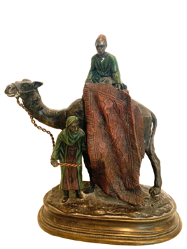 bronze marchand à dos de chameau et son page en bronze patiné . XX siècle .