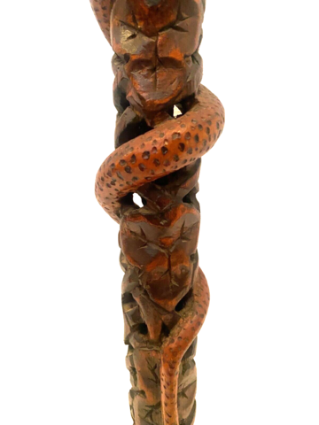 cane minimaliste décor d'un personnage et serpent finement sculpté . XX siècle .