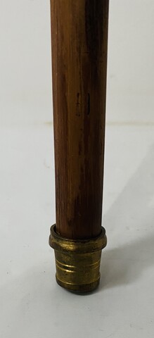 canne à décor africain en os et boule en bronze fut bambou . XX siècle .