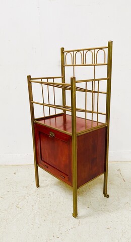 casier à musique formant bar en laiton et caisson en acajou vernis . XX siècle .