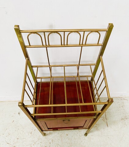 casier à musique formant bar en laiton et caisson en acajou vernis . XX siècle .