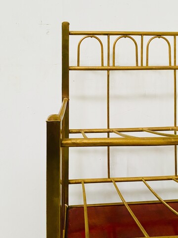 casier à musique formant bar en laiton et caisson en acajou vernis . XX siècle .