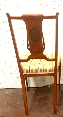 chaise louis XVI en bois de placage à décor de rinceaux . XIX siècle .