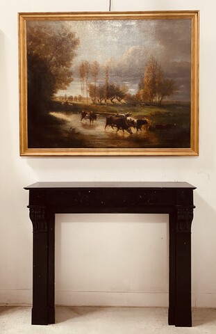 Cheminée époque Napoléon III a corbeau en marbre noir . XIX siècle .