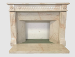 cheminée louis XVI à rehaut en marbre massif décor à cannelure . XX siècle .