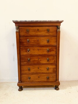 chiffonnier époque empire en acajou dessus marbre pieds griffes . XIX siècle .