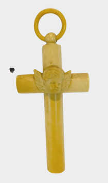 croix de berceau agrémente d'une tête de putti . XX siècle .