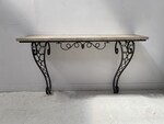 élégante console art déco en fer jambages galbée dessus marbre . XX siècle .