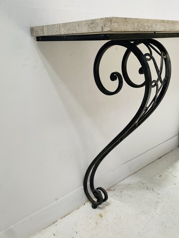 élégante console art déco en fer jambages galbée dessus marbre . XX siècle .