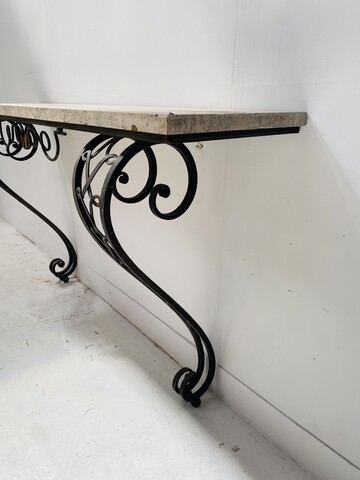 élégante console art déco en fer jambages galbée dessus marbre . XX siècle .