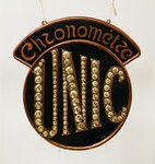 enseigne publicitaire de la marque UNIC en stuc patiné et miroir . XX siècle .