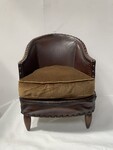fauteuil club art déco assises tissus dossier recouvrement cuir . XX siècle .