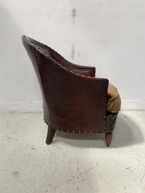 fauteuil club art déco assises tissus dossier recouvrement cuir . XX siècle .