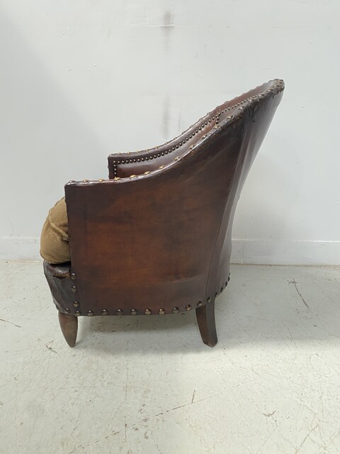fauteuil club art déco assises tissus dossier recouvrement cuir . XX siècle .