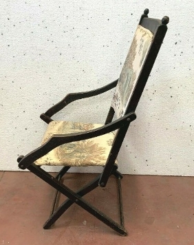 Fauteuil pliant en bois noirci XX siècle