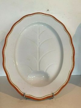 Grand plat de présentation sur pied a bordure orange XIX siècle