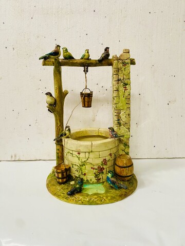 important puits en faïence de Vallauris de Delphin Massier . XX siècle .