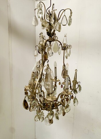 lustre cage monture bronze à pampille neuf bras de lumières . XX siècle.