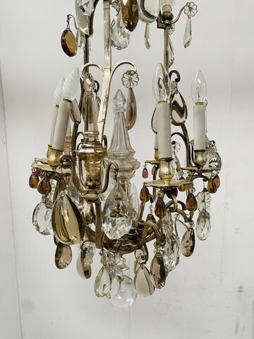 lustre cage monture bronze à pampille neuf bras de lumières . XX siècle.