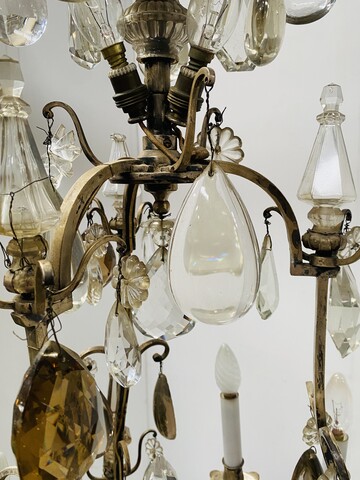 lustre cage monture bronze à pampille neuf bras de lumières . XX siècle.