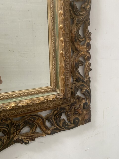 miroir circa 1950 à décor antique cadre bois doré . XX siècle .