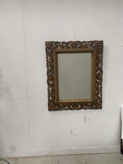 miroir circa 1950 à décor antique cadre bois doré . XX siècle .