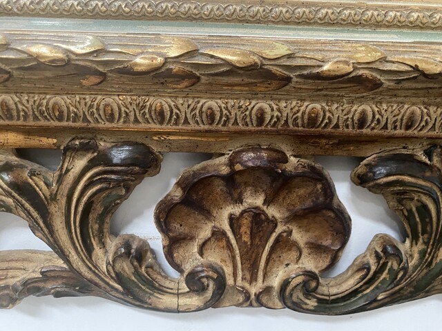 miroir circa 1950 à décor antique cadre bois doré . XX siècle .