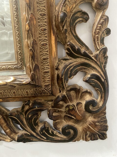miroir circa 1950 à décor antique cadre bois doré . XX siècle .