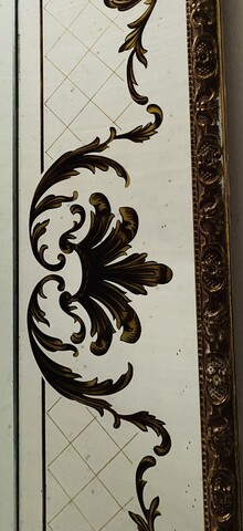 miroir circa1950 verre églomisé décor antique cadre stuc doré . XX siècle .