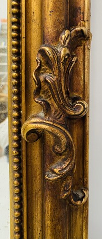 miroir en bois et stuc doré à décor de feuillage . XIX siècle .