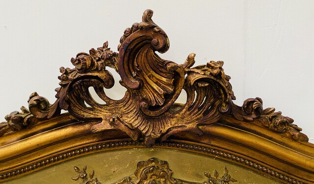 miroir en bois et stuc doré à décor de feuillage . XIX siècle .