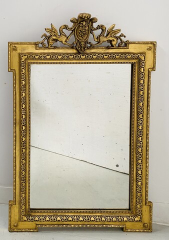 miroir en stuc à coquille patine doré décor animal fond en sapin . XIX siècle .