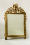 miroir Louis XVI en bois doré finement sculptée à décor de colombe . XIX siècle.