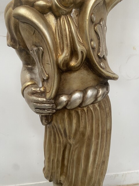 Nubiens formant lampadaire en bois argenté et or cinq éclairages .XX siècle.