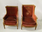 paire de fauteuils à oreilles style Louis XVI finement sculptée doré .XX siècle.