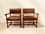 paire de fauteuils à torsade assises dossier recouvrement cuir . XX siècle .