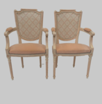 Paire de fauteuils de style Louis XVI en hêtre patiné à l'antique . XX siècle .