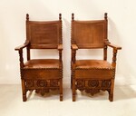paire de fauteuils haut dossier à assises dossier recouvrement cuir . XX siècle.