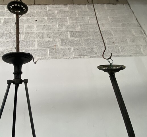 paire de lustres du XIX siècle en bronze patiné à décor de masques . XIX siècle