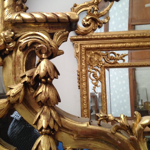paire de miroirs à pare closes de style Louis XIV en bois doré . XIX siècle .